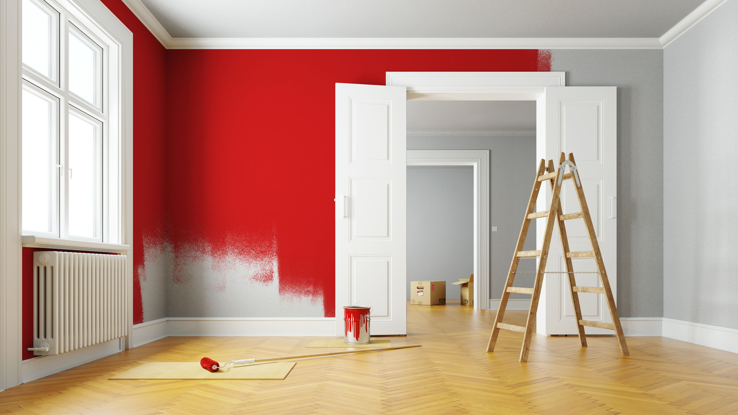 Innenanstrich + Außenanstrich – Peter Weigert leerer heller Raum mit teilweise gestrichener roter Farbe an der Wand